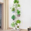 etagere pot de fleur en aicer à étages blanche avec des plantes