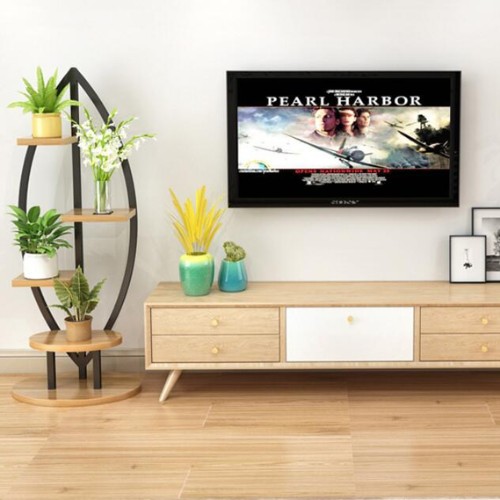 meuble pour plante en bois et métal noir et beige dans un salon