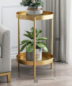 table pour plante doré avec un pot de fleurs