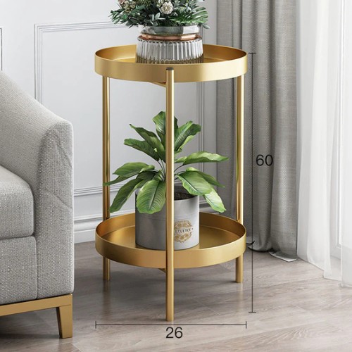 table pour plante doré avec un pot de fleurs