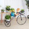 porte plante vélo avec des plantes dessus